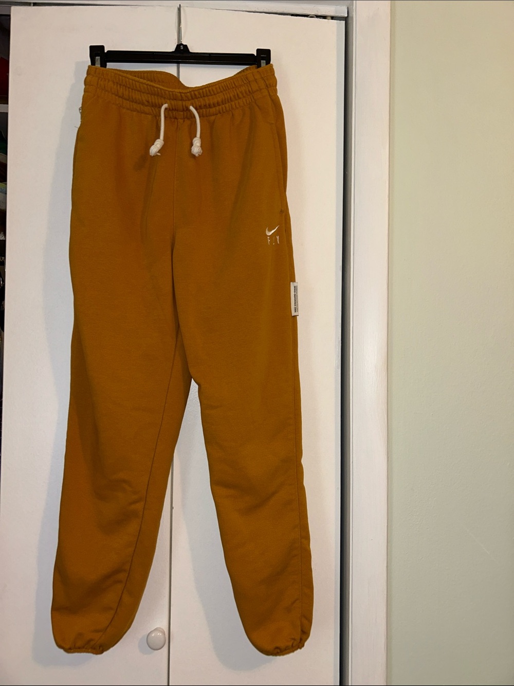 Nike Dri Fit gold joggers